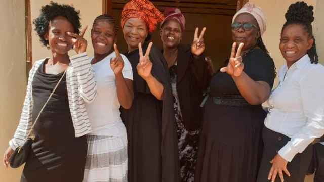 Unity is strength- women happy to be working for a common goal.