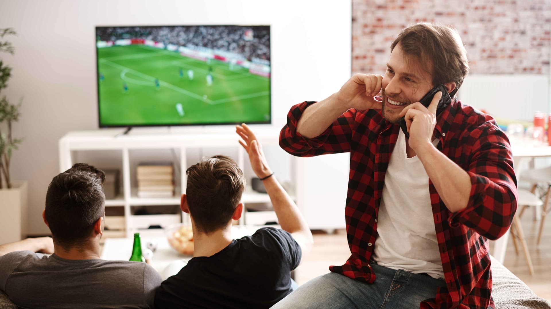 People Watching Match with family