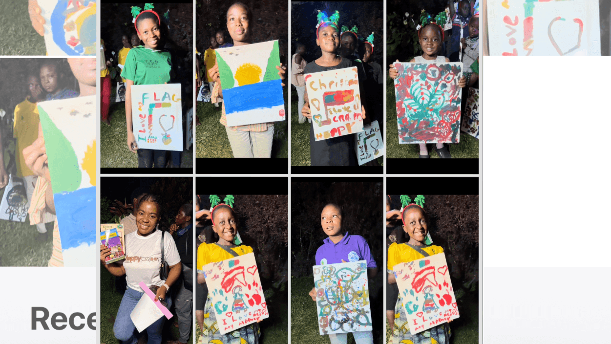 Adolescent girls displaying their art works in excitement and telling the story behind their paintings 