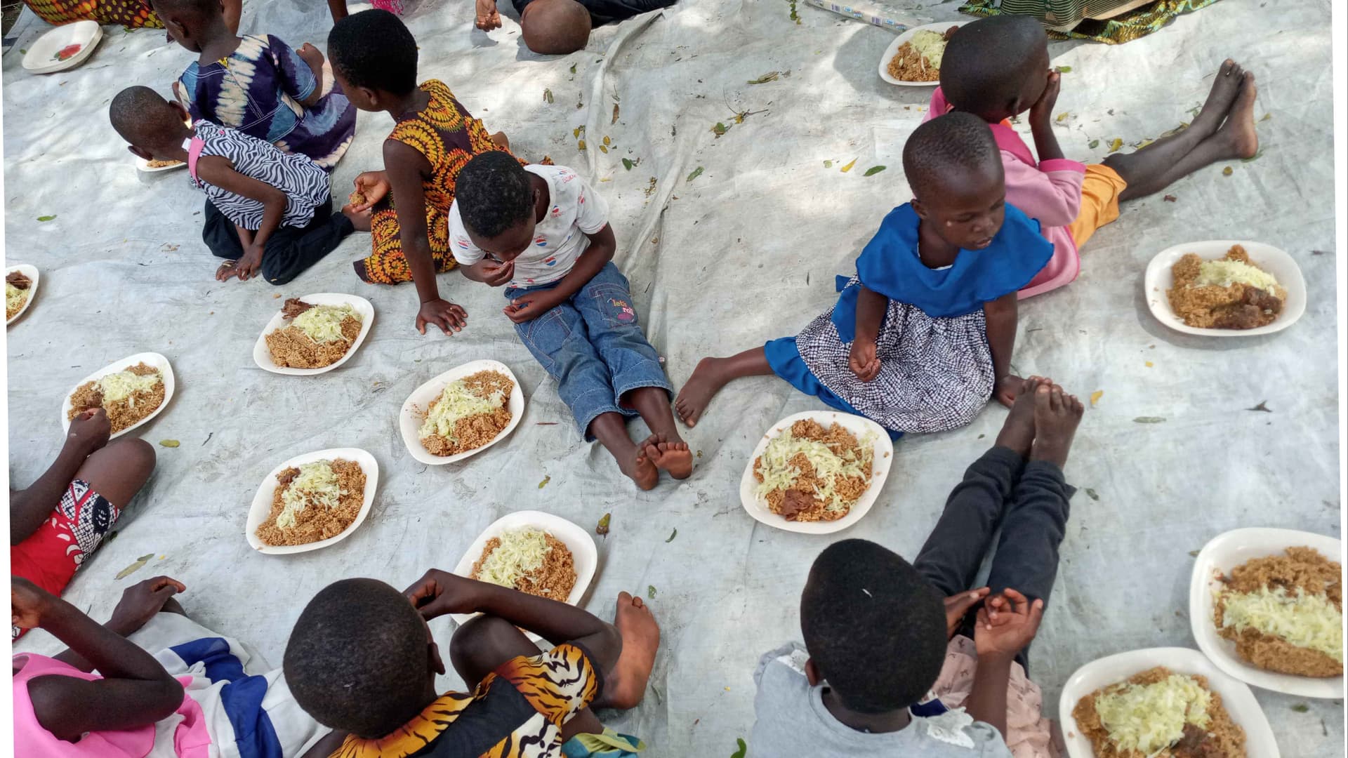 Having a meal donated by friends with the disadvantaged children at the ministry, Join the team and keep them smiling
