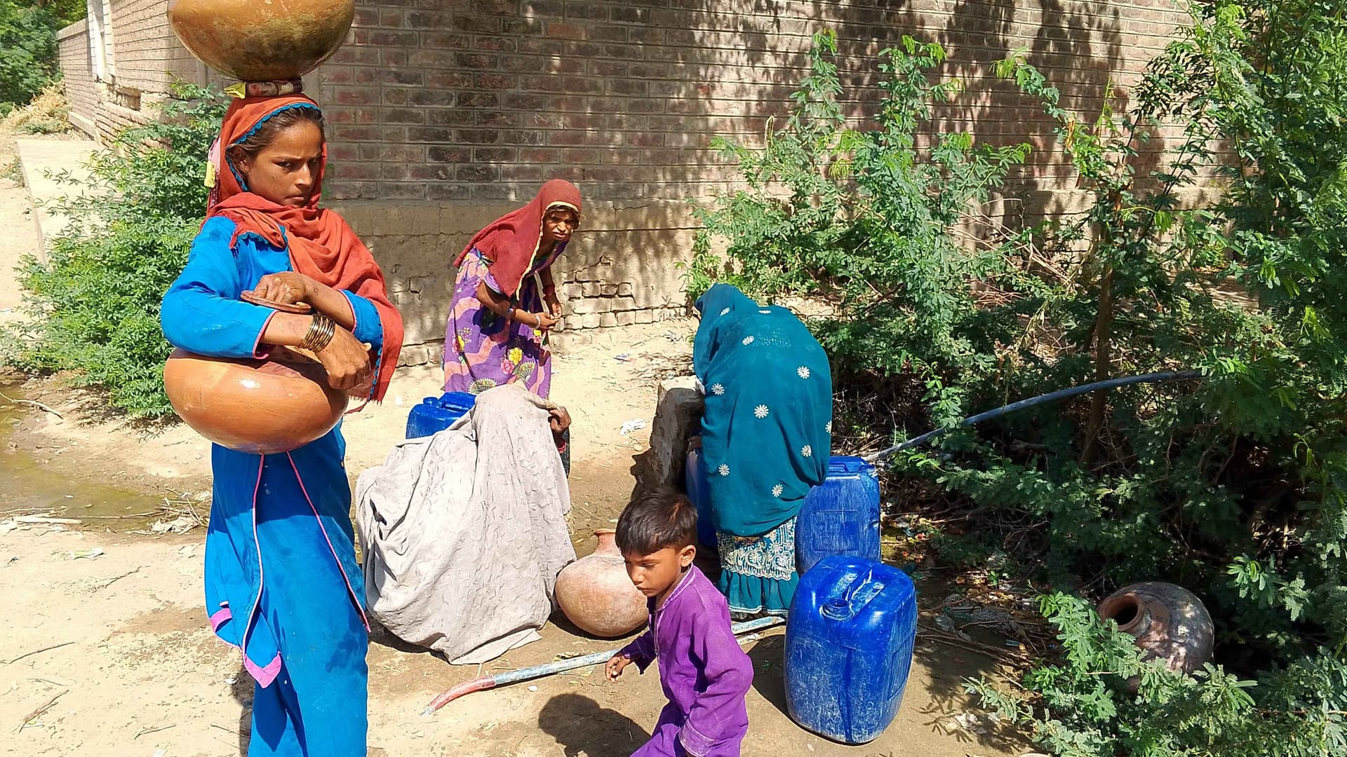 In every drop of water she carries, there’s a story of strength, sacrifice, and silent courage.