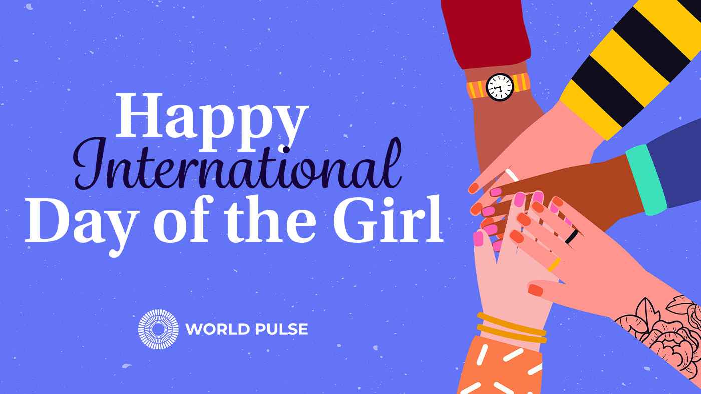 Image is a purple background with text that reads "Happy International Day of the Girl!" with a World Pulse logo. There is an illustration of five women's hands embracing.